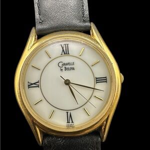 Caravelle by Bulova Gold and Black Watch. New Kreisler glove leather band